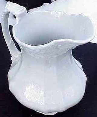 F11-a.White ironstone Embossed Fuchsia pitcher 19kB.jpg (18945 bytes)