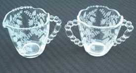 J13-a.Tiffin Glass fuchsia creamer and sugar bowl 13kB.jpg (12641 bytes)