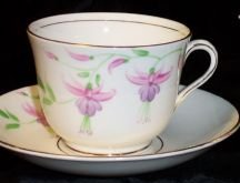 C14-a.Phoenix cup&saucer and creamer 15kB.jpg (7630 bytes)