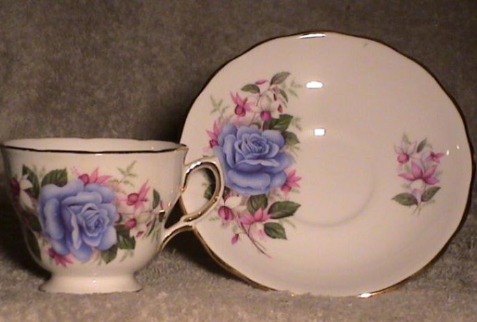 C28 Bone china cup&saucer blue rose and fuchsias 47kB.jpg (48281 bytes)