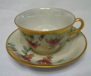 C91-Handpainted cup&saucer Millie Weaver 14kB.jpg (13911 bytes)
